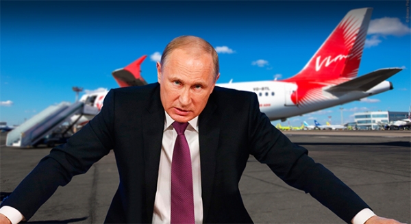 Путин одобрил закон о "черных списках" авиадебоширов